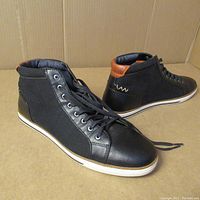 Pair of black Aldo men's high top shoes size 11 photographed angled to show front and side views.