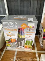 Front view of the boxed NutriBullet Pro Magic Bullet Pro 900 Series showcasing branding and key features.