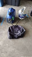 All items together: generator, propane tank, cover