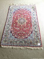 Full view of rug showing overall pattern and condition