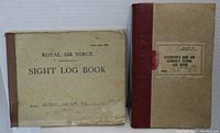 Front view of Royal Air Force Sight Log Book and Observer's and Air Gunner's Flying Log Book showing condition and labeling.