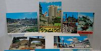 Postcards showing various Montreal views including highways, downtown buildings, and a red bus scene.