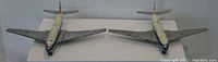Top view of two Dinky Toys De Havilland Comet airplane models showing wings and fuselage markings with BOAC livery.