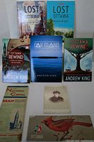 Six books related to Ottawa local history by Andrew King and David McGee, plus two folded vintage paper maps and a cabinet card photo.