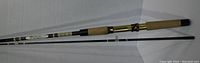 Full length view of the Berkley Buccaneer CB30 7 foot fishing rod showing cork grip, rod body, and tip.