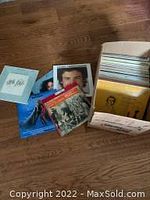 Box of vinyl records showing album covers and general contents