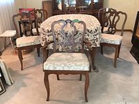 Group of six chairs around a table