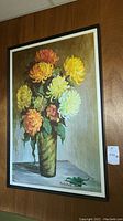 Front view of framed print showing vase with chrysanthemums and signature.
