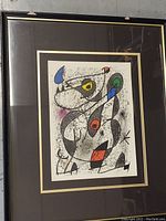 Full front view of the framed lithograph