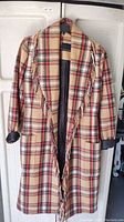 Plaid fringed winter coat by Banana Republic, showing full front with fringe details and plaid pattern