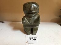 Front view of soapstone Inuit Eskimo woman carving
