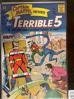 Front cover of Captain Marvel Presents The Terrible 5 #1 comic book showing the title and the illustration of Captain Marvel restrained by The Terrible 5 villains.