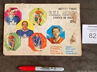 Front cover of the 1961/62 York Peanut Butter NHL Hockey Card album showing vintage NHL player portraits and bilingual text in English and French.