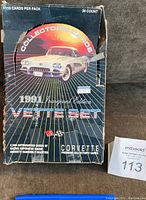 Front view of 1991 Corvette Vette Set unopened wax box with vintage car and text on blue background showing wear and tear