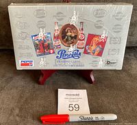 Front view of the unopened sealed wax box showing vintage Pepsi-Cola art and branding on shrink wrap.