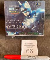 Front view of the sealed Batman Forever movie sticker wax box showing Batman artwork, character names, and Topps branding.