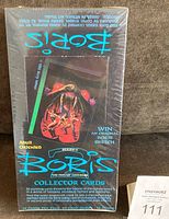 Front and top down views of the sealed wax box of Boris Series 2 trading cards by Comic Images showing box art, text and condition.