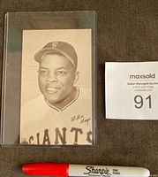 Front view of the sepia tone exhibit card showing Willie Mays in San Francisco Giants uniform with signature.