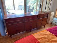 Front and right angle view of the dresser showing overall design