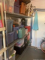 Photo showing the full wire shelving rack loaded with plastic bins and items, highlighting the rack's size and structure.