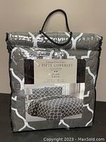 Front view of the packaged 2 piece coverlet set with Elizabeth label.