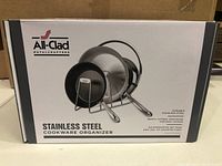 Box for the All-Clad Stainless Steel Cookware Organizer with branding and pictorial on front.