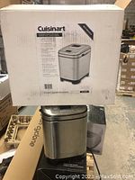 Photo of the original packaging box showing brand, model, and features.