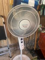 Full view of Black & Decker Silent Force Typhoon pedestal fan showing fan head, pedestal stand, and base.
