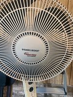 Front view of the Black & Decker Silent Force fan grille with branding and blade technology text visible.
