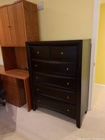 Full front view of six-drawer dresser in dark finish