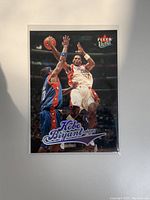 Front view of the 2004 Fleer Ultra Kobe Bryant basketball card showing Kobe in action.