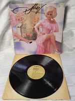 Vinyl record from Dolly Parton Heartbreaker album showing Side A label and vinyl surface condition.