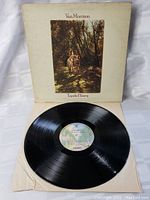 Front view of the Van Morrison Tupelo Honey vinyl record cover with a horse and man image.