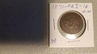 Front side of 1871 PEI one cent coin mounted in a cardboard holder with '1871-PEI-1¢ VF-XF' handwritten on the holder.