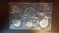 Seven uncirculated Canadian coins sealed in plastic packaging from 1979.
