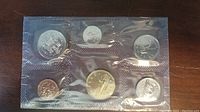 1994 Canadian uncirculated coin set sealed in plastic packaging showing six coins of various denominations and designs.