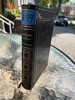 Front cover and spine of the hardcover book showing decorative gold embossing and condition.