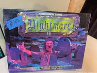 Photo of the front of the vintage video board game box 'Nightmare II The Sequel'.