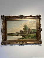 Overall view of framed oil painting hanging on wall