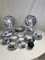 Overview of all dinner and serveware items arranged on table