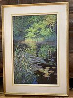 Full frontal view of the framed painting showing overall composition and frame.