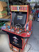 Front view of NBA Jam Arcade1Up cabinet in workshop