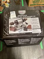 Original retail box for Craftool Pro burnishing machine with product image and branding