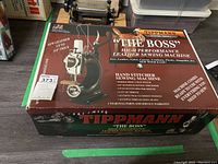 Original box with Tippmann The Boss branding and model details
