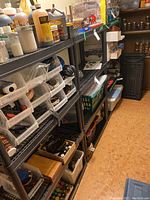 Side view showing contents on shelves and shelving structure details