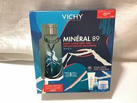 Retail box of Vichy Mineral 89 limited edition gift set with blue and white Lunar New Year packaging and product image.