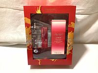Full view of sealed Shiseido gift box showing Ultimune concentrate and mascara in packaging.