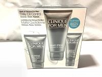 Front of the sealed Clinique For Men travel set box showing the three skincare products included: cream shave, oil control face wash, and mattifying moisturizer.