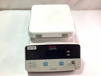 Front view of the hot plate showing the control panel with digital display and buttons.