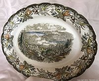 Ridgway Heritage serving platter, oval, 14 x 11 inches, with detailed hand-engravings of Halifax Bartlett early Canada 1842 scenes and botanical border in earth tones.